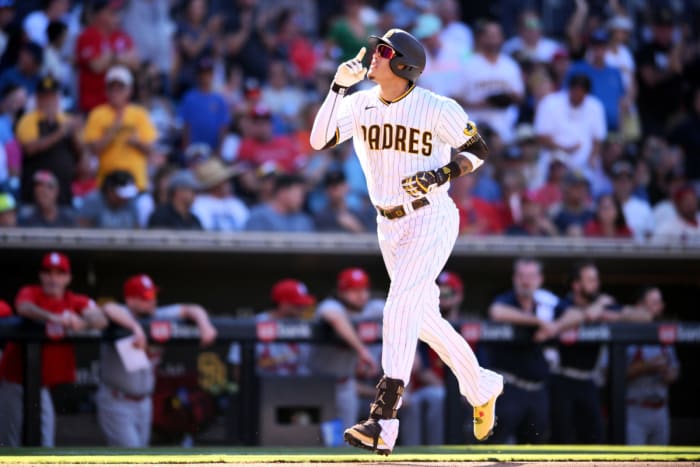Manny Machado celebrates as he rounds the bases after hitting a home run